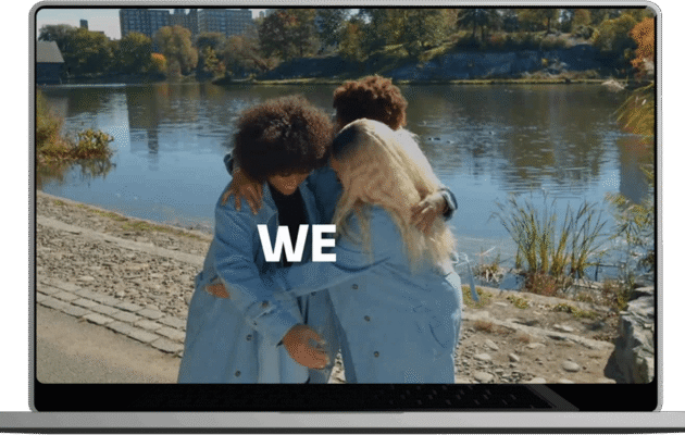 Three people united in an embrace